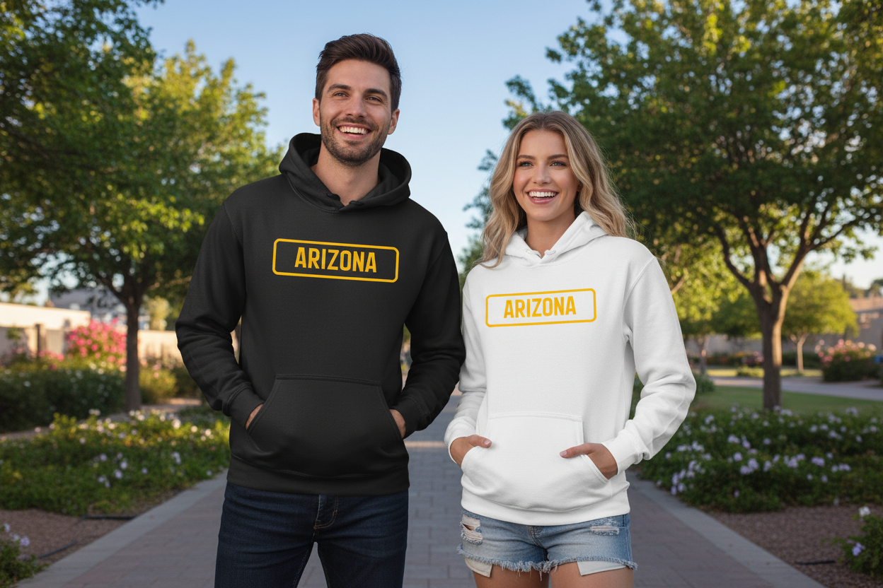 Male and female models wearing black and white hoodies side by side